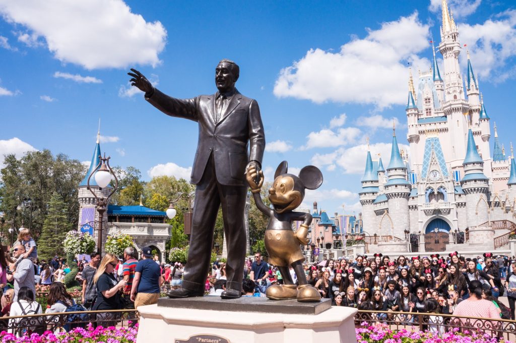 Walt Disney and Mickey Mouse in front of Cinderella's Castle in Magic Kingdom Walt Disney World